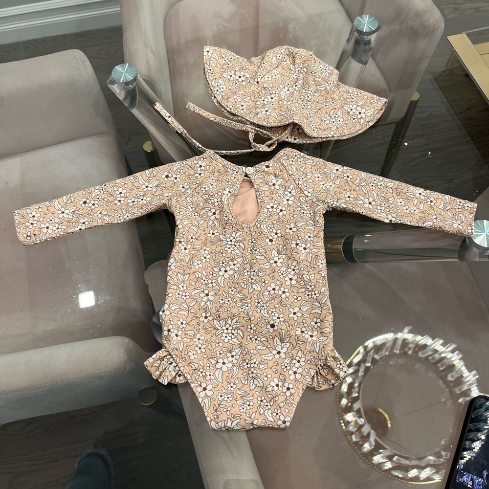 Quincy Mae swimsuit and matching hat size 3-6 months brand new condition!